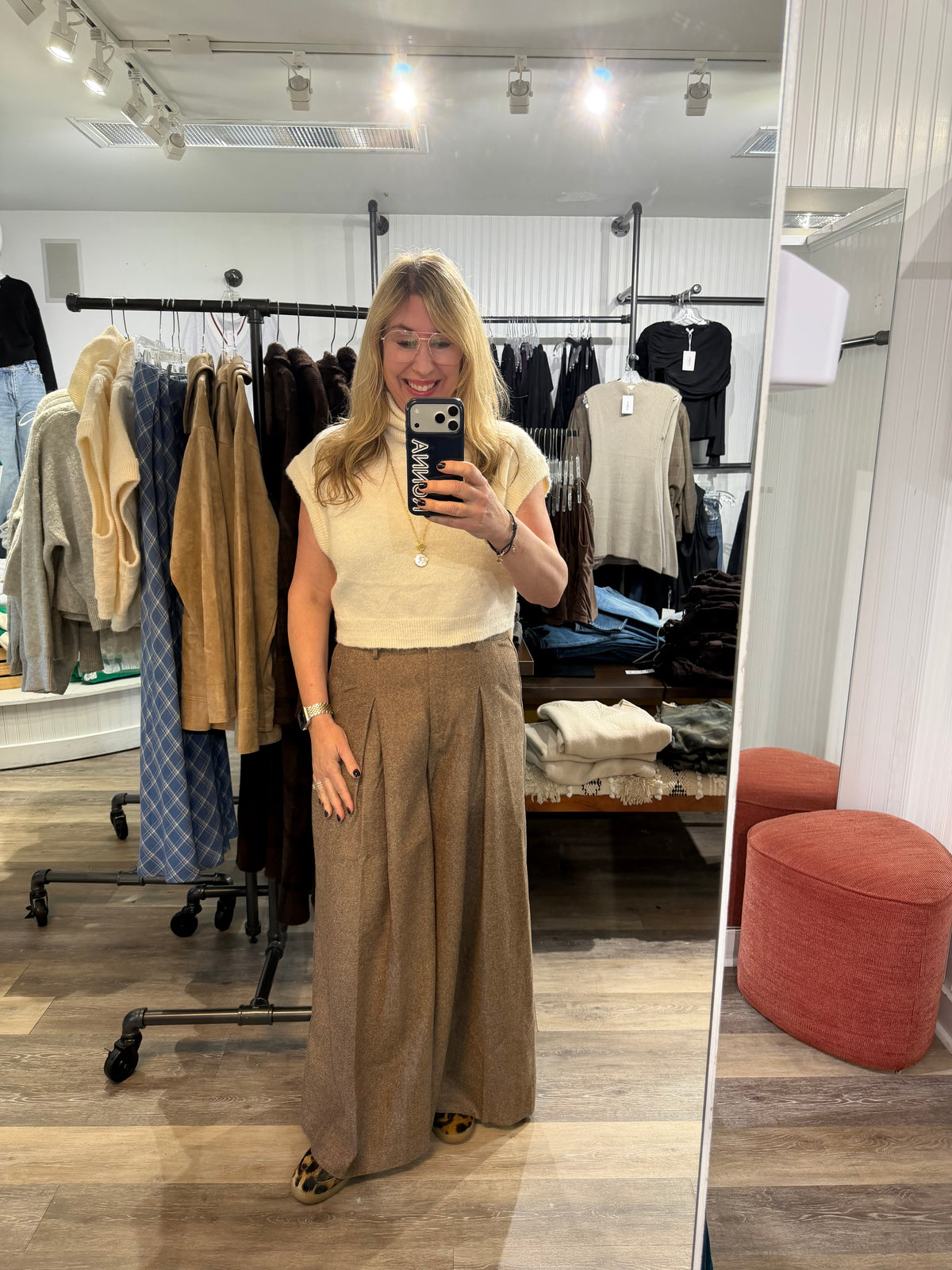 Brown wide-leg tailored trousers with inverted pleat front and belt loops