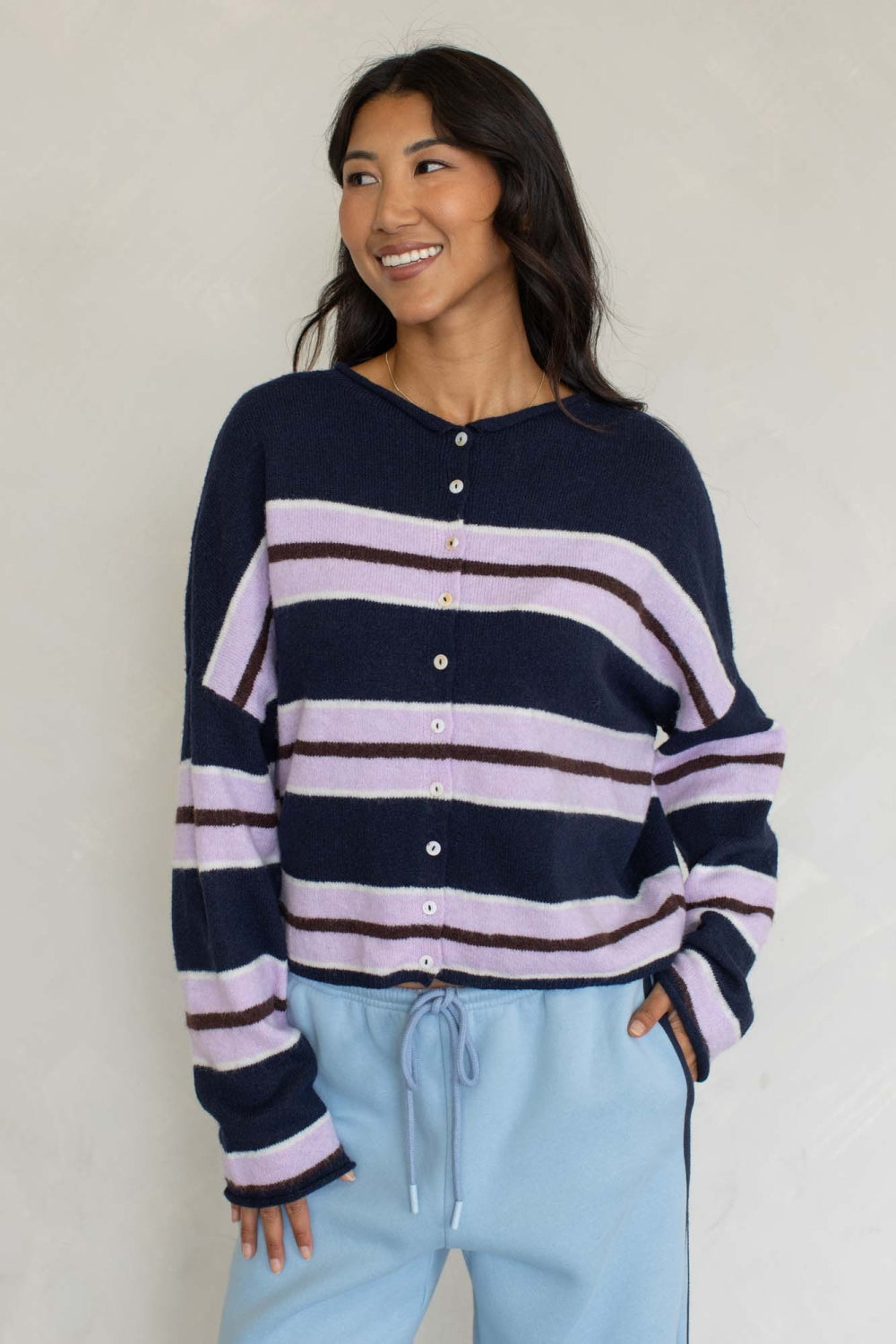 Navy varsity stripe cardigan with lavender horizontal stripes, button front, long sleeves