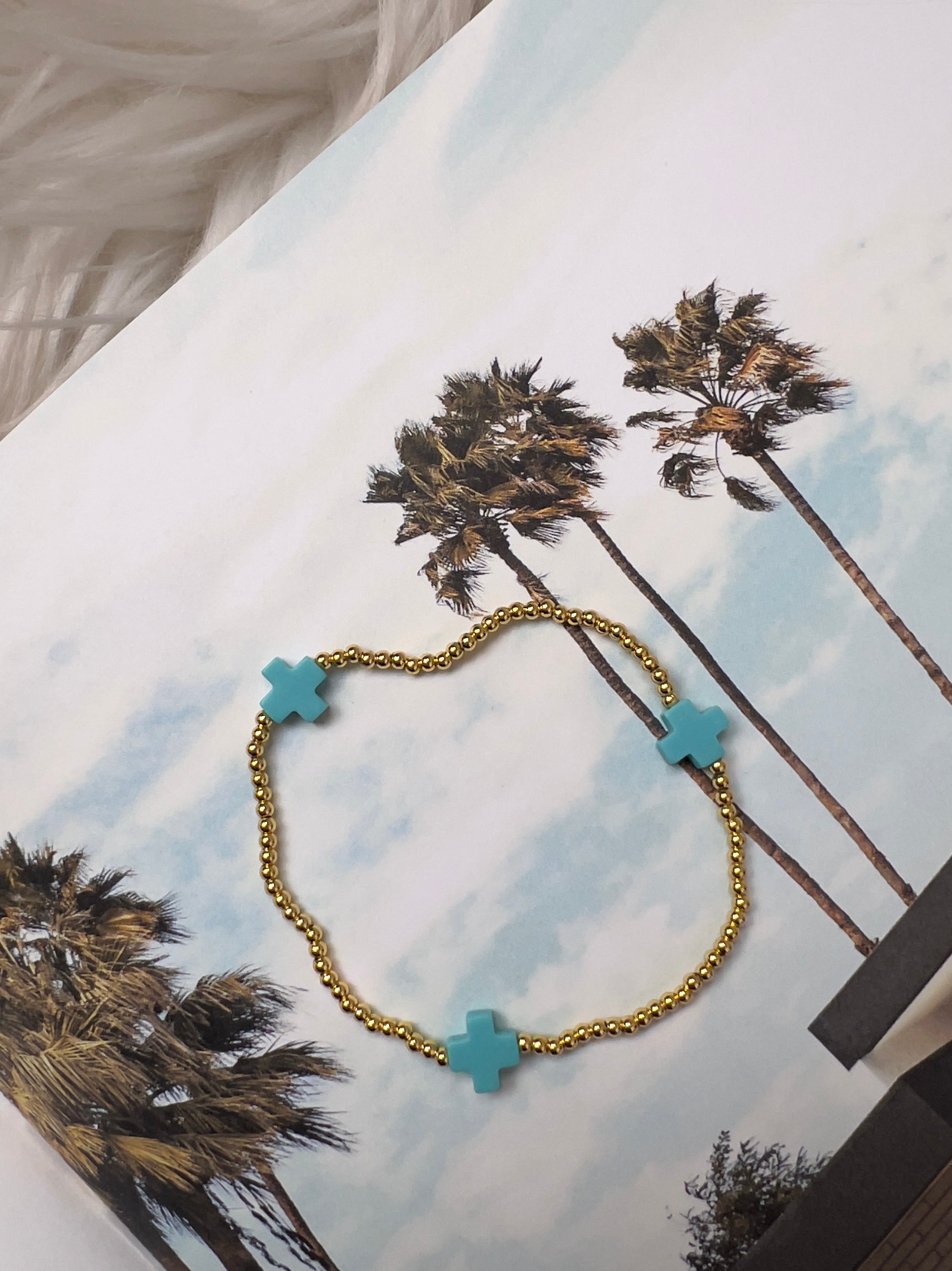 Venice Aqua — Gold Bead Bracelet with Aqua Crosses