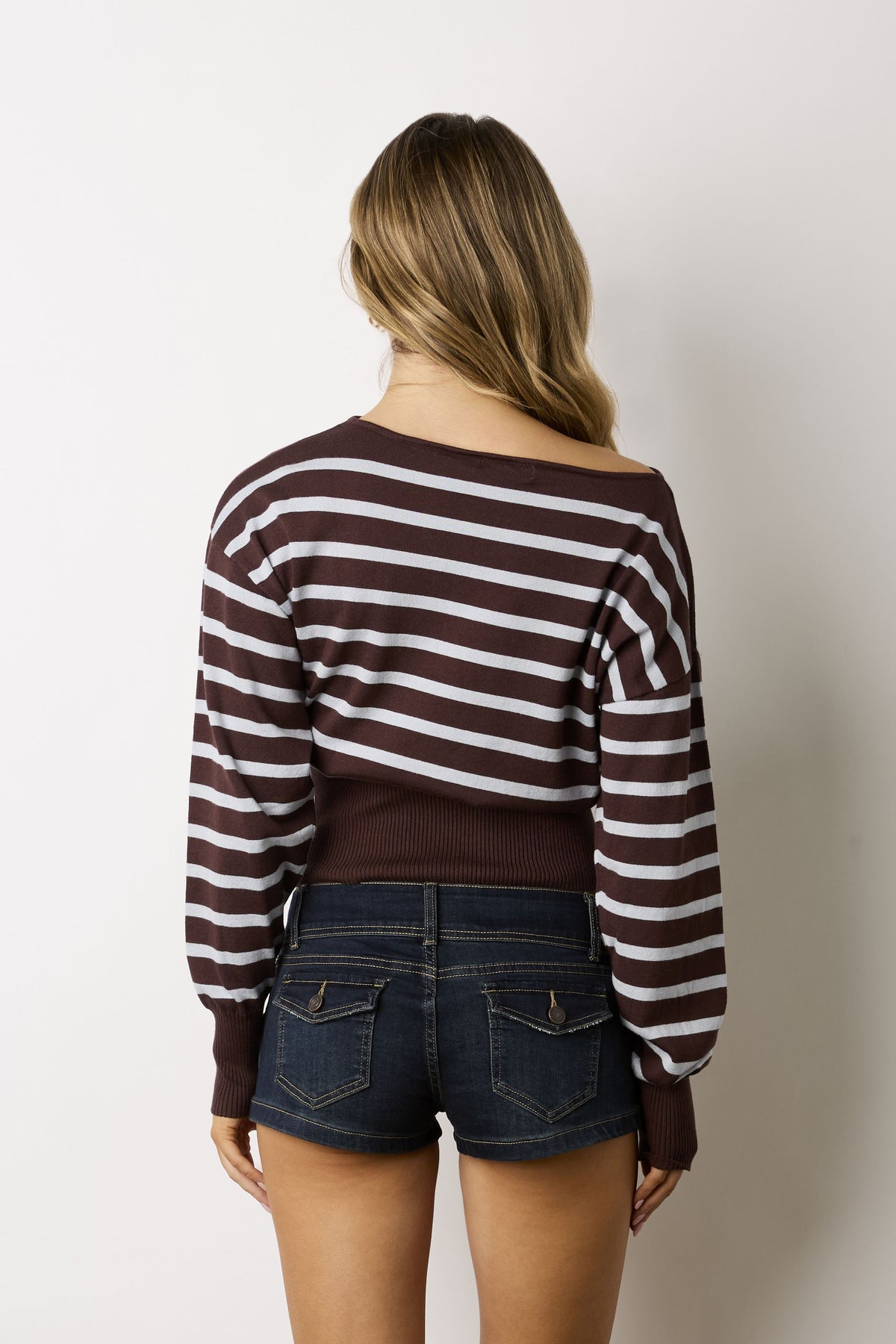 Off-the-shoulder striped sweater in dark chocolate with white stripes, long sleeves