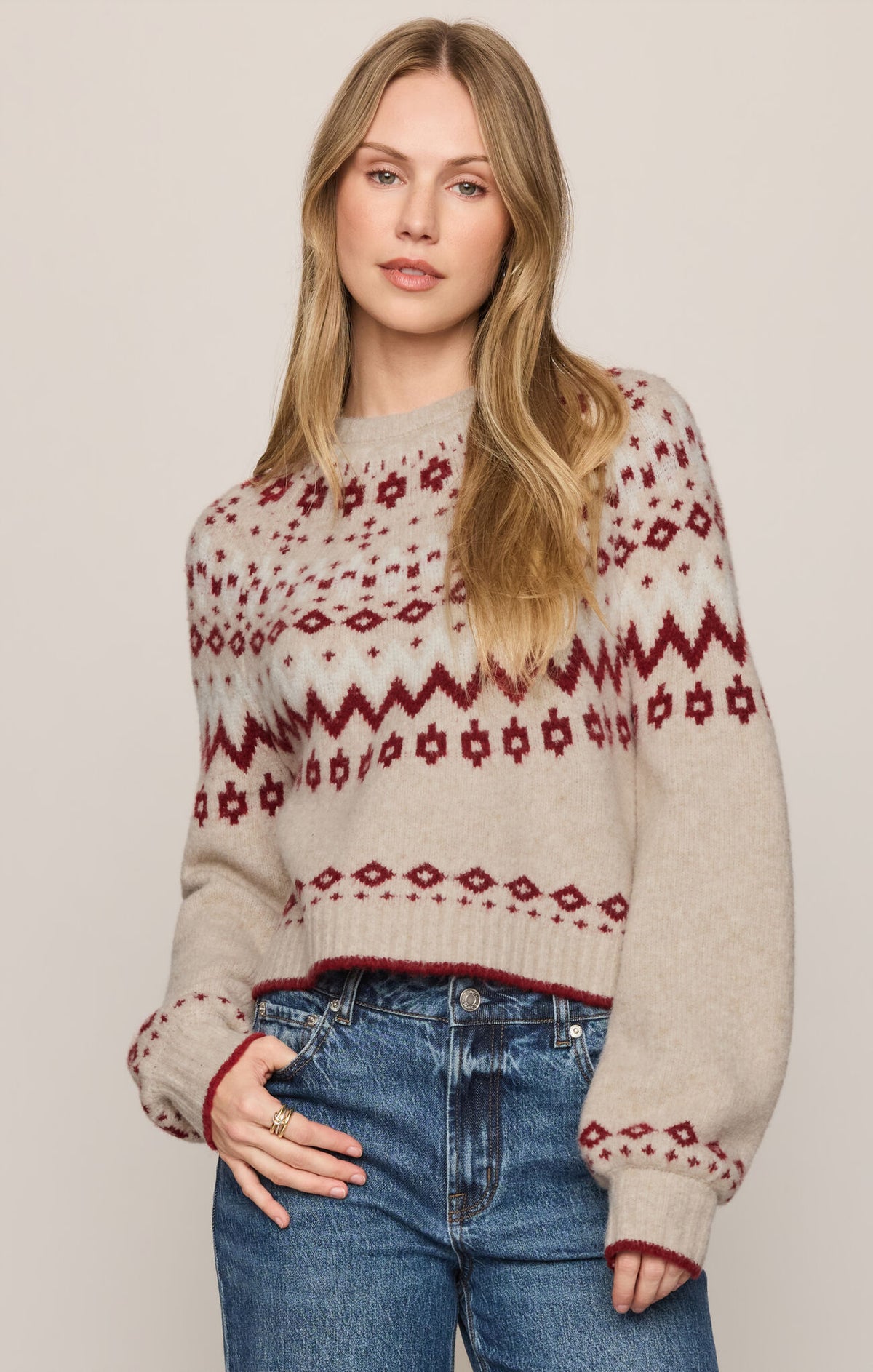 Heather oatmeal crew neck knit sweater with red Fair Isle pattern, long sleeves