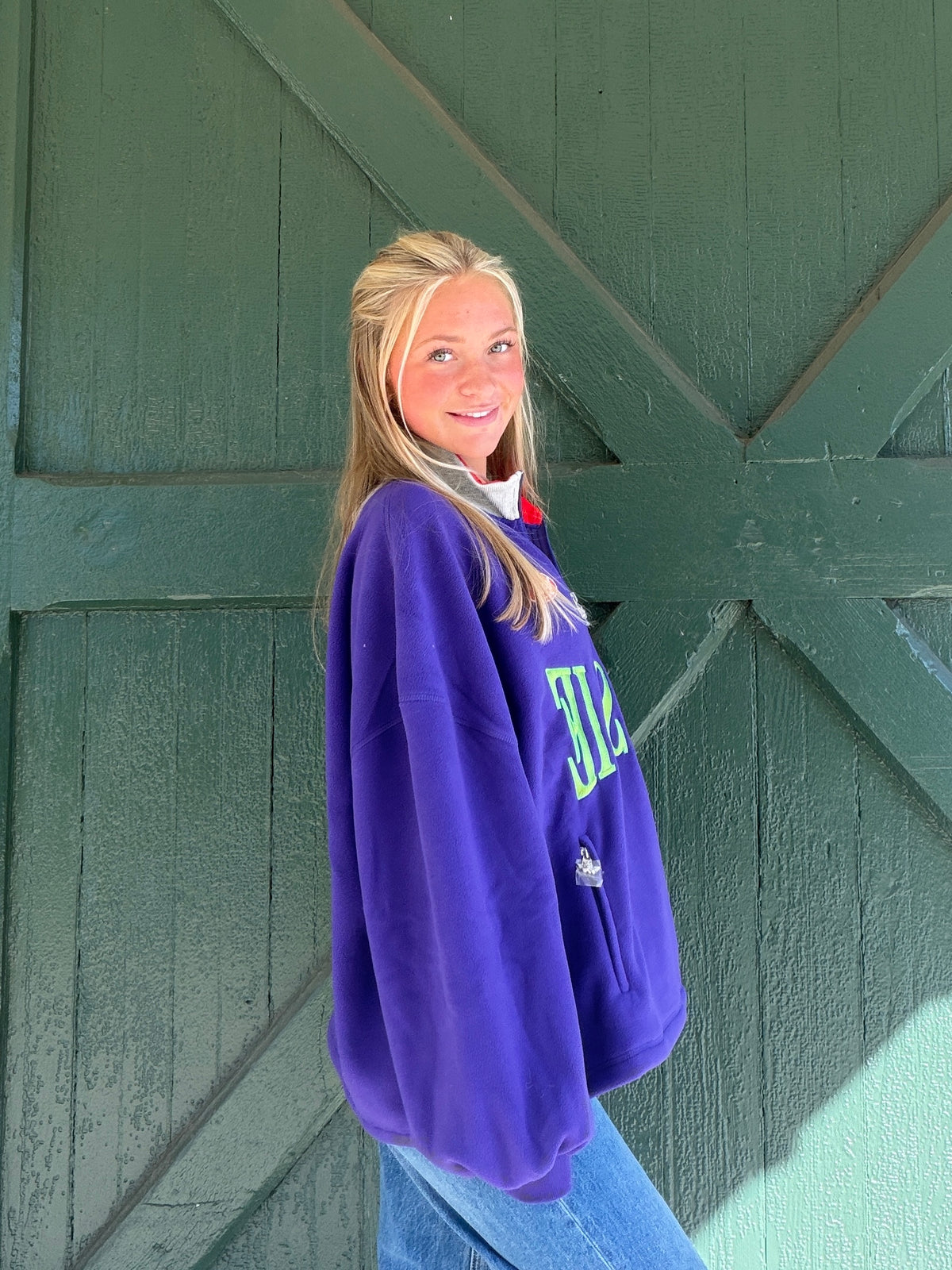 Purple sweatshirt with 'BOYS LIE' graphic on chest, relaxed crew fit