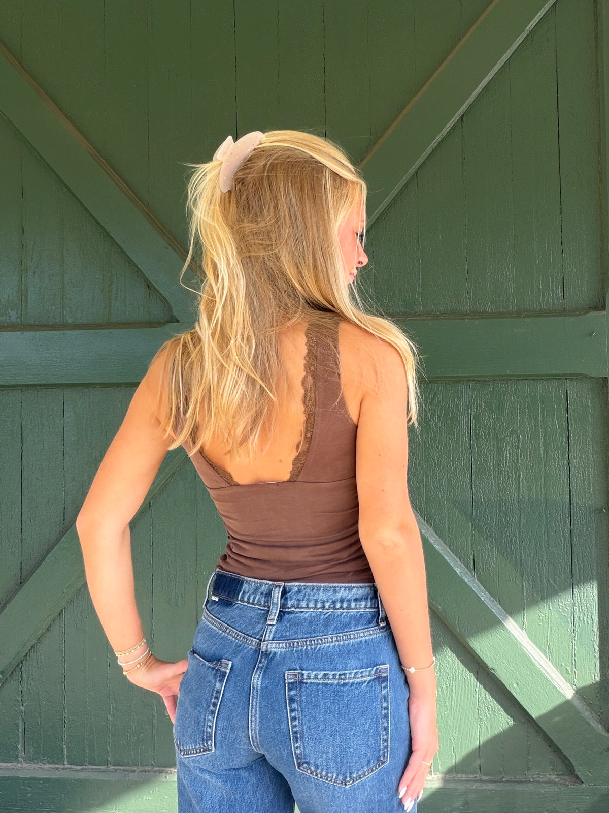 Brown ruched tank top with lace-trim scoop back and racerback straps