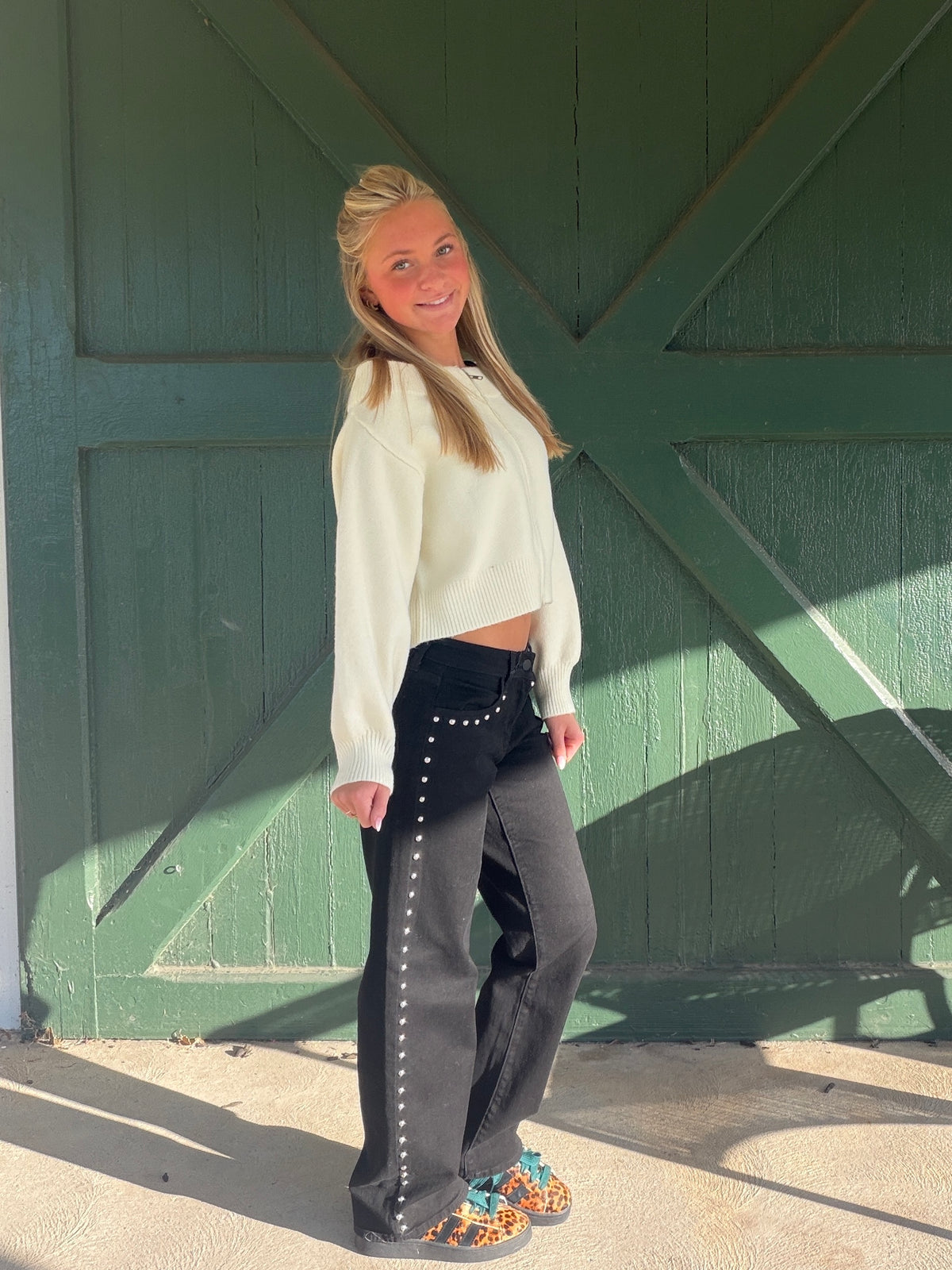 Black wide-leg baggy denim jeans with studded side stripe detail