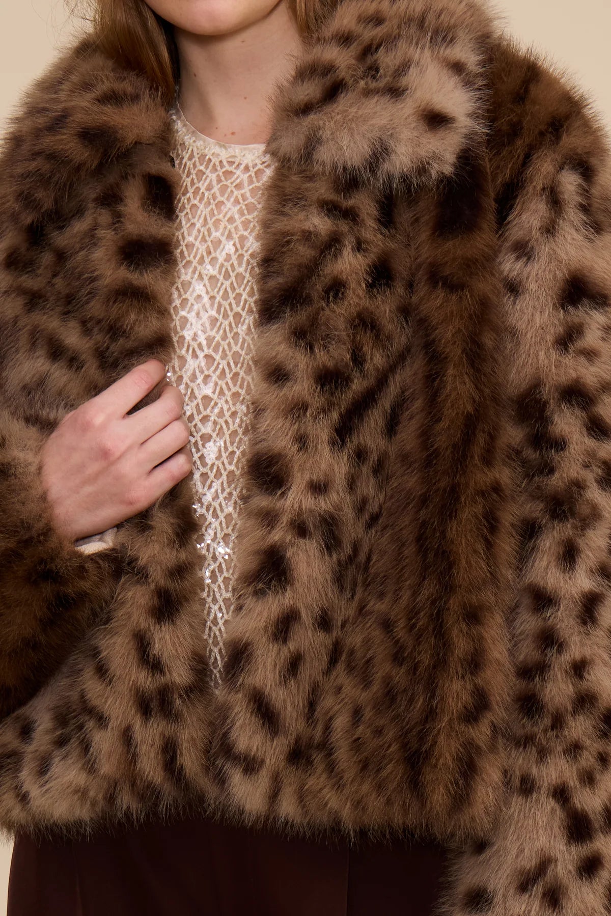 Leopard faux fur jacket with open front and soft fuzzy collar detail