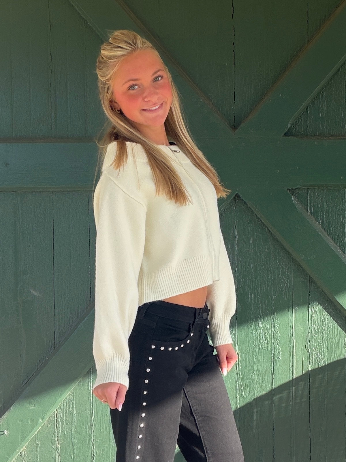Cream off-the-shoulder sweater with front zipper, ribbed hem, long sleeves