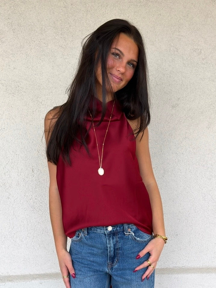 Deep merlot halter scarf top with draped neck and sleeveless bodice