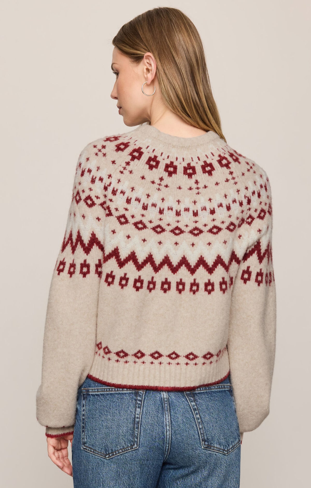 Heather oatmeal crew neck knit sweater back with red Fair Isle motif, long sleeves